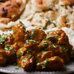 Butter chicken on basmati rice (contains dairy and nuts)
